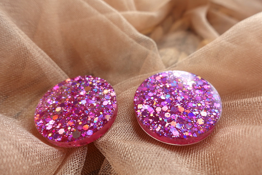 Maxi studs glitter oorbellen holografisch roze
