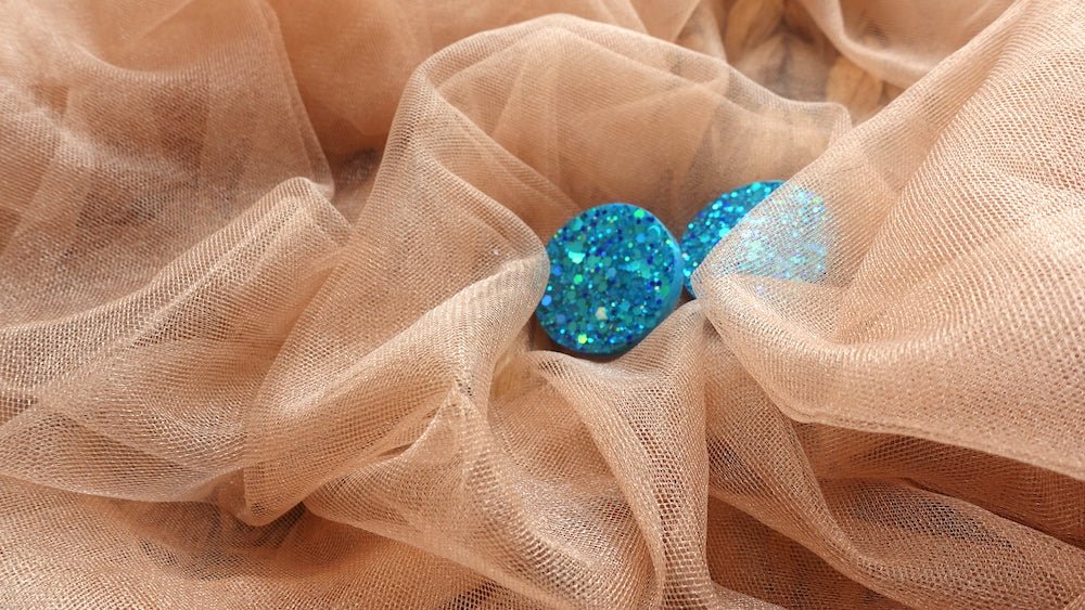 Maxi studs turquoise glitter oorbellen