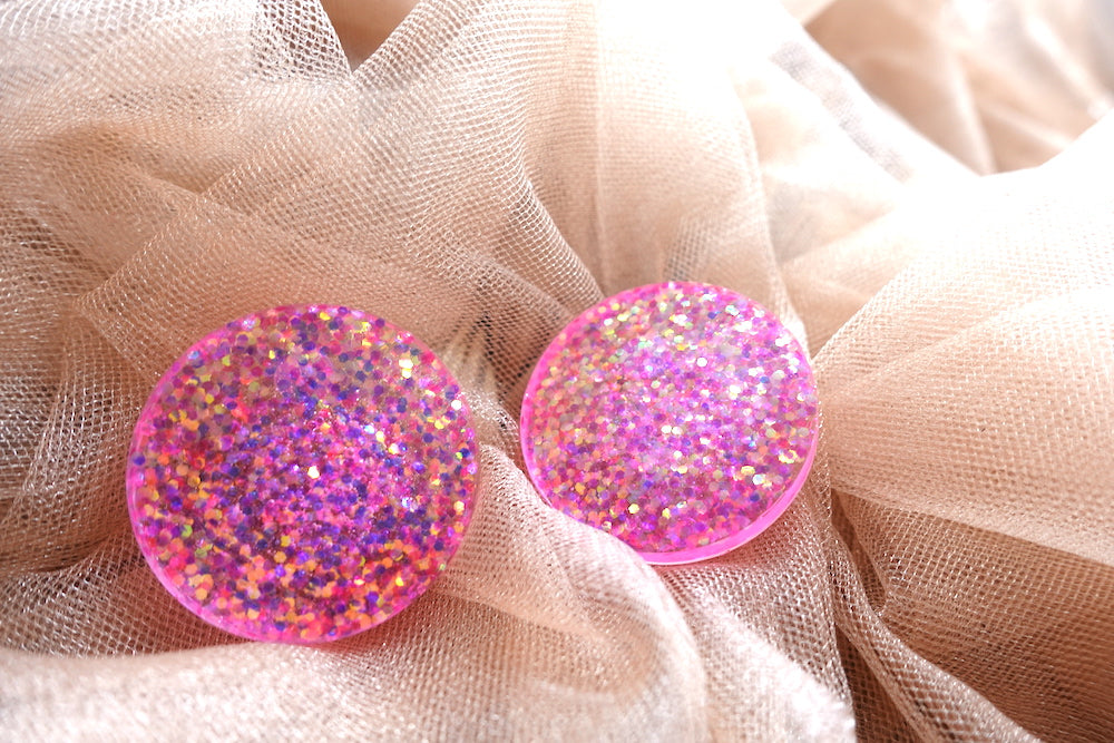 Maxi studs roze glitter oorbellen