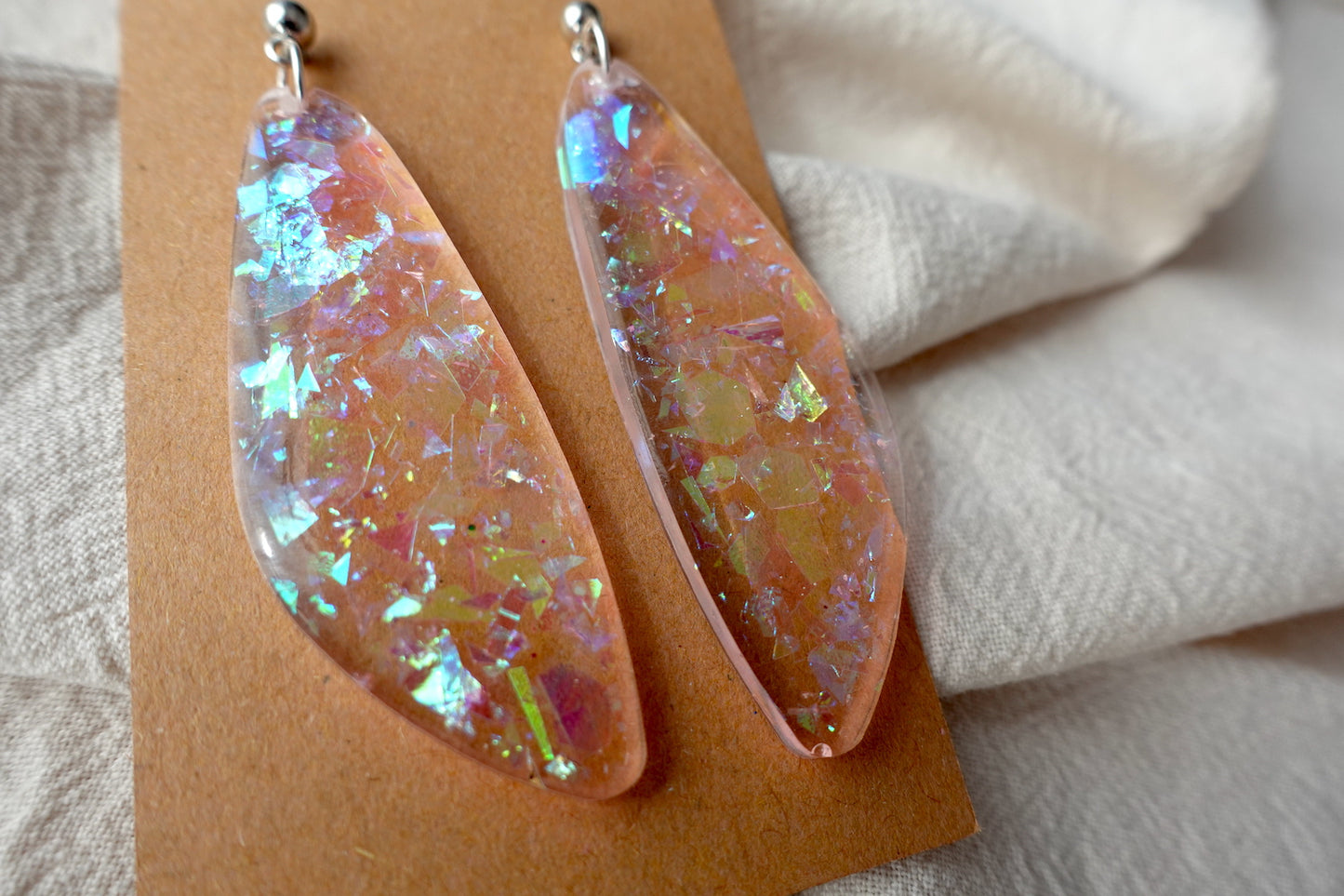 Vleugel oorbellen doorzichtig flakes - statement oorbellen