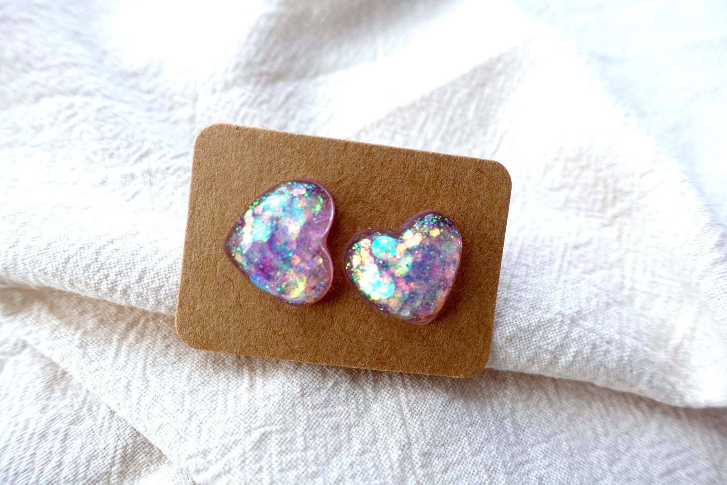 Hartjes 'opal' lichtroze glitter oorbellen studs- statement oorbellen