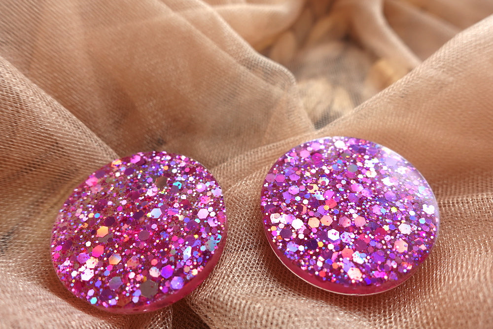 Maxi studs glitter oorbellen holografisch roze