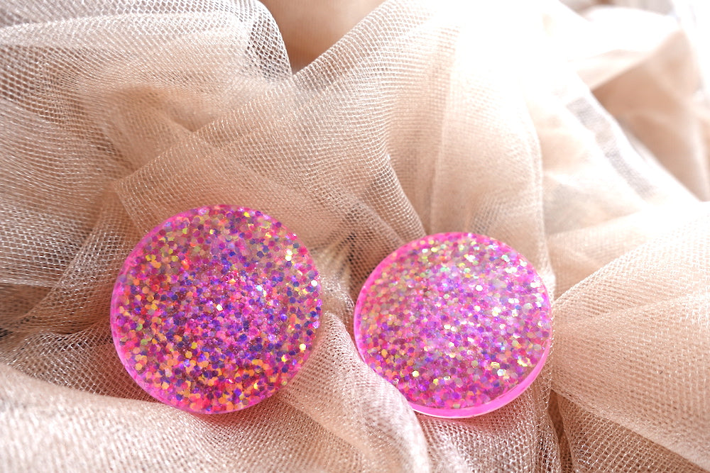 Maxi studs roze glitter oorbellen