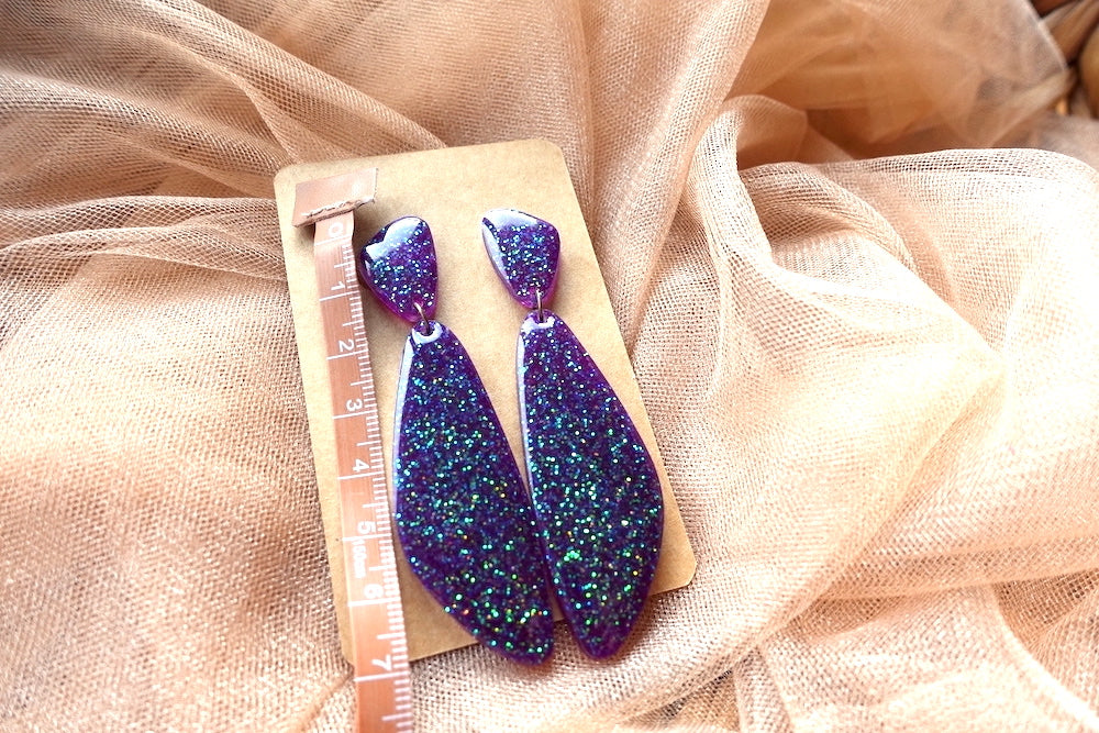 Paarse oorbellen glitter libellevleugels- felgekleurde oorbellen