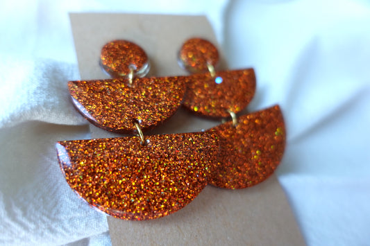 Oranje holografische oorbellen met glitter - statement oorbellen