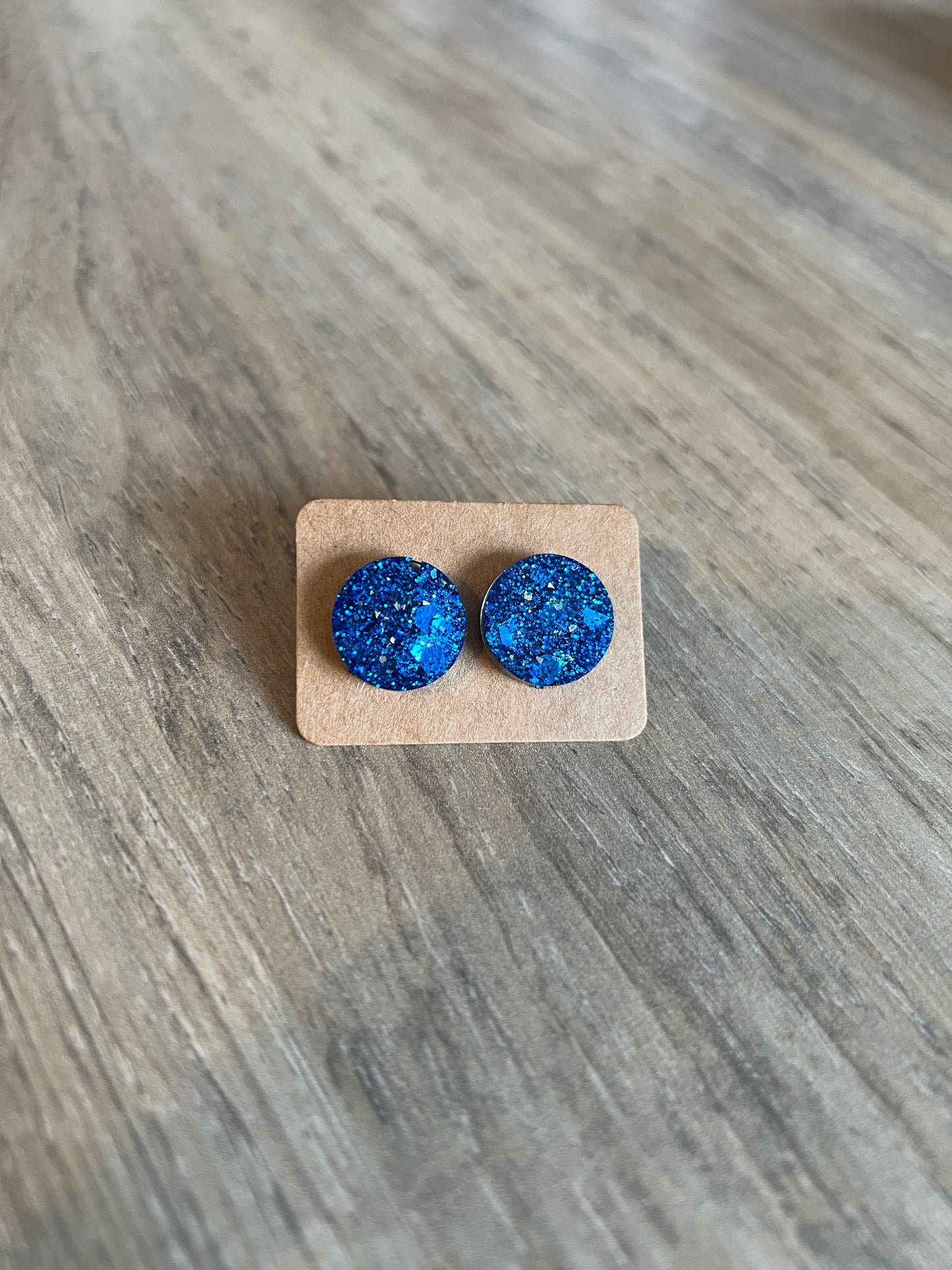 Donkerblauw glitter oorbellen mini oorstekertjes SKU 219